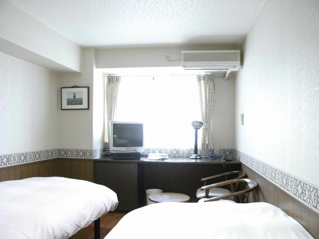 Sunplaza Rinkai Hotel Oszaka Szoba fotó